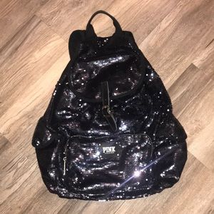 Gently used PINK sequin backpack.